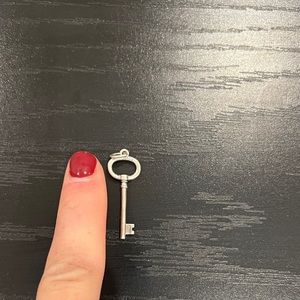Tiffany & Co key necklace charm. Sterling silver.